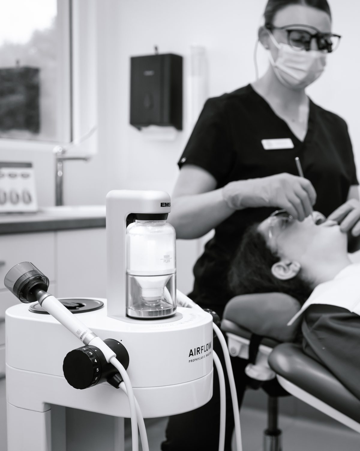 The Airflow GBT unit in use during a hygiene appointment at Red Hill Dental Practice