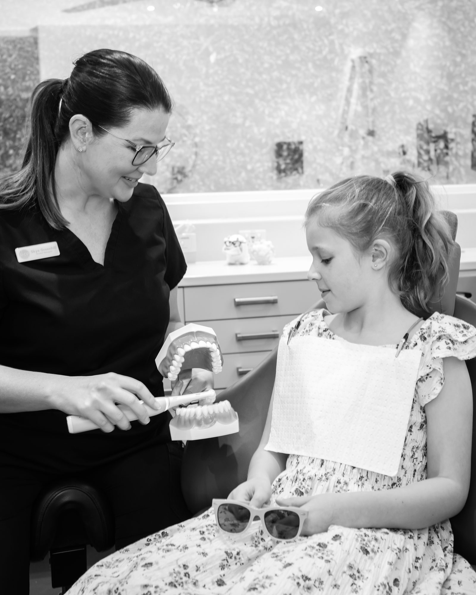 A child becoming familiar with the dental chair at Red Hill Dental Practice